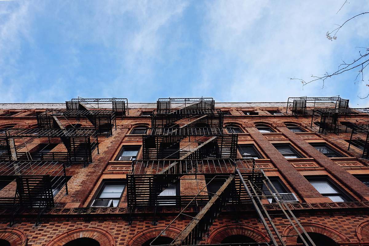 new york worm's-view photo of brown concrete building architecture